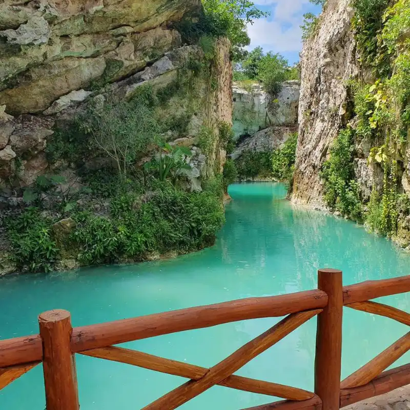 Pool Cocom open cenote with turquoise water and limestone walls at Santa Bárbara