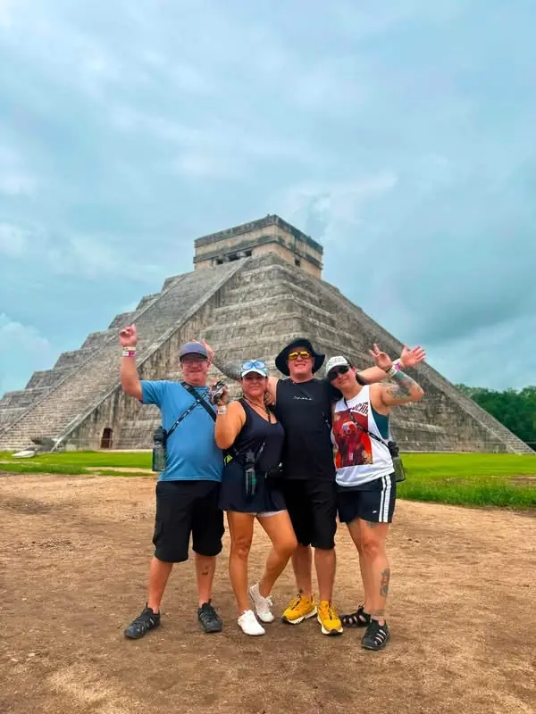 Travelers in front of El Castillo at Chichén Itzá